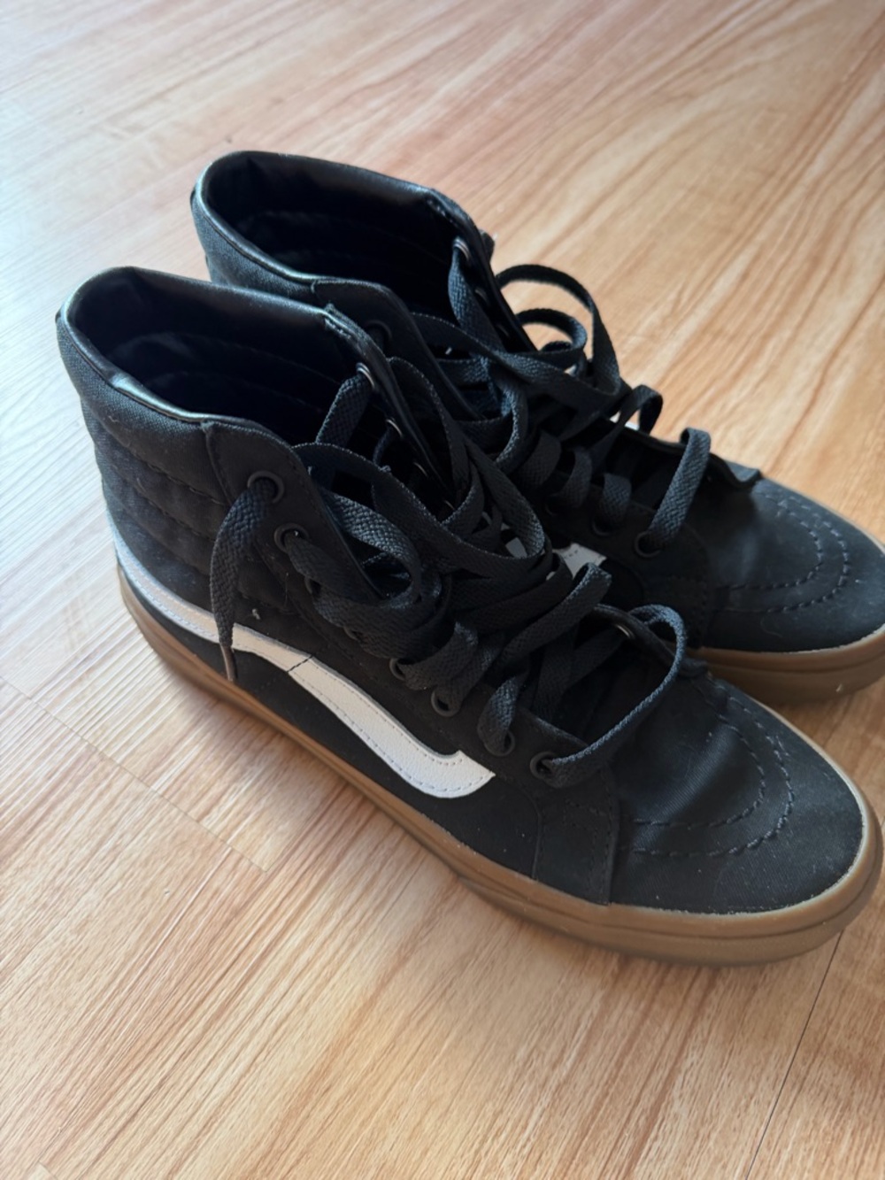 Vans Black High-Top Sneakers with White Side Stripe gum sole